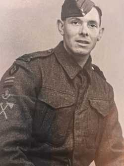 Sidney John Bruton in uniform. Notice the 48th (South Midland) Divisional insignia on his arm together with a cloth KSLI badge and a Pioneer Corps Trade badge
