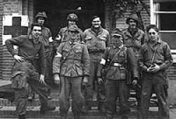 Paul R. Miller is standing at the front, left side of the picture. We used the German Medics as litter bearers until we shipped them back to the holding compound.