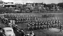 "D" Company, RR of C march past having taken the "stick" that day