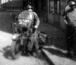 A picture from Felix's private collection, with an unknown GI on a Harley Davidson Liberator motorcycle in Cherbourg, France.