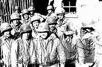 Men of M Company. Back row: Schraeder, Stoll and Hill. Middle row: Gwynn, Combs, Savage, Cook and Kliby. Front row: Jennigs, unknown, unknown and Priest.