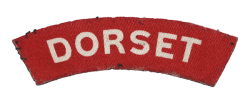 A genuine printed WW2 Dorset Regiment Shoulder title