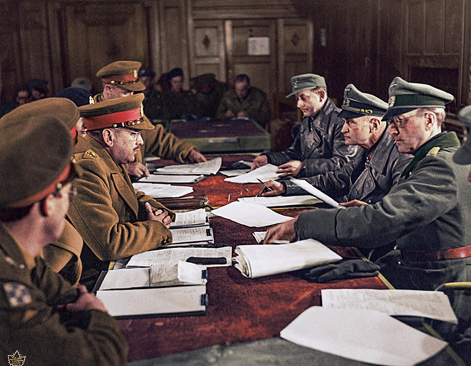 German Generaloberst Blaskowitz signs the surrender-of German forces on May 5, 1945 in 'Hotel de Wereld' in Wageningen.