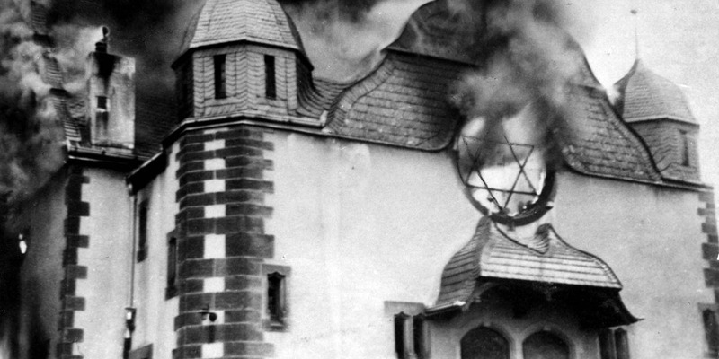 A synagogue burns during Kristallnacht, November 1938.