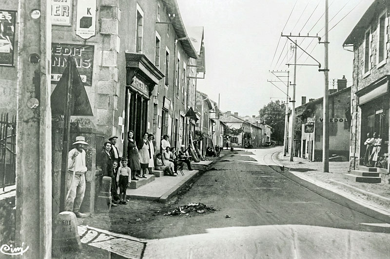 Early postcard showing the main street of Oradour-sur-Glane before WW2