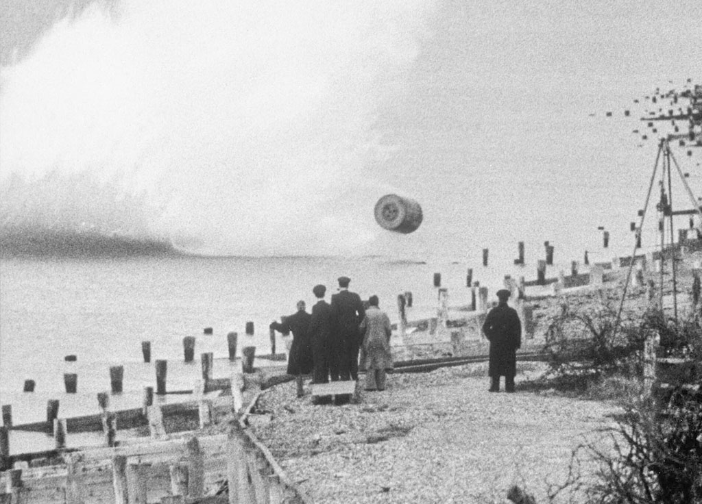 Barnes Wallis watches a practice Upkeep bomb run at Reculver in Kent.