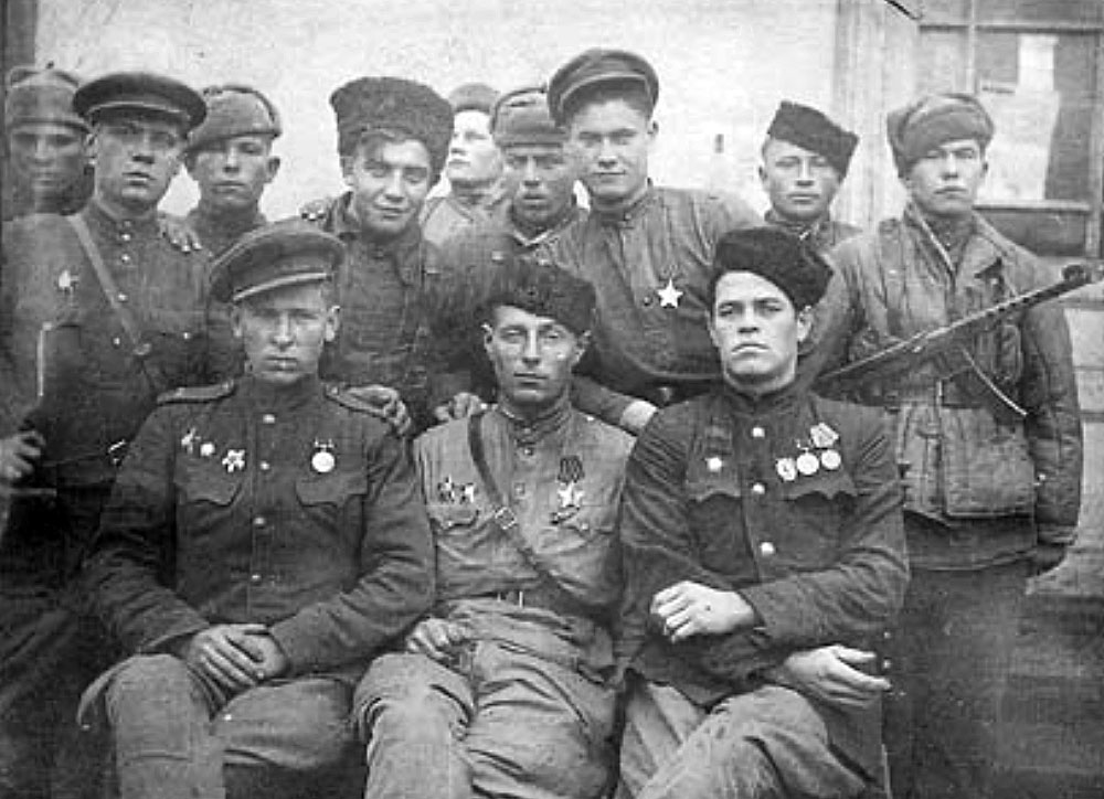 Back row: the Tartar man who drowned in the Hron river, Petr Kouznetsov, Mstislav Ivanov, an unknown man and unknown man, Vasiliy Sgourin. Front row: a Platoon Commander, Platoon Commander Ivan Ivanovich Kouznetsov, Company Commander Voenkov