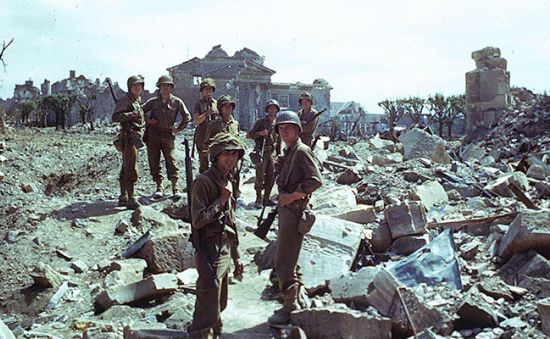 Troops moving inland after D-Day