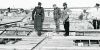 SS check the work of the slave labourers