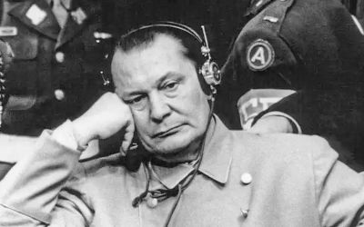 Hermann Göring and Rudolf Hess listening to the proceedings. The initial attitude of the defendants was one of arrogance and annoyance, treating the tribunal as a temporary inconvenience they could outsmart or escape.