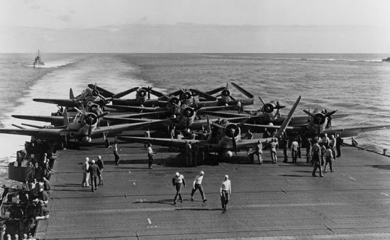 Aircraft are prepared for launch aboard USS Hornet as the United States Navy prepares for the Battle of Midway in June 1942.