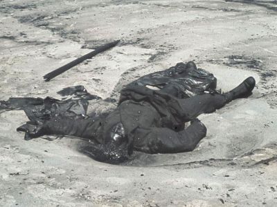 Oil-covered body of a British soldier
