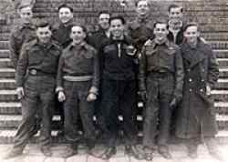 Glucksburg, Germany, May 1945. George is in the middle of the back row.