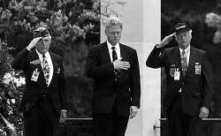 Alvin (on the left) with President Bill Clinton at the wreath-laying at the American Cemetery in Normandy on the 50th Anniversary of D-Day in 1994. The man on the right is Walter Ehlers.
