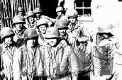 The crew of the LCI (L) 83, my ship. in Darthmouth, England prior to D-Day. In the far right of the picture you can see Coast Guard Commander Jack Dempsey, former heavyweight champion of the world.