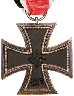 Eiserne Kreuz, 2. Klasse (Iron Cross Second Class) Received on December 16, 1944 as he wrote in a letter to his parents, dated Dec 22, 1944. It was awarded to him for his fighting in Lorraine in the first week of December, near the villages of Diemeringen and Weislingen. During the fighting his closest friend was shot running next to him.