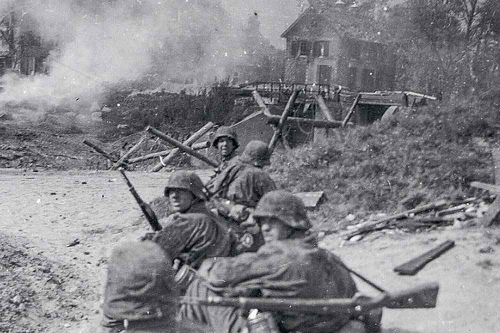 German troops launch a brutal assault on the 'Grebbeberg' ridge during the afternoon of May 11, 1940, a crucial battle in the invasion of the Netherlands