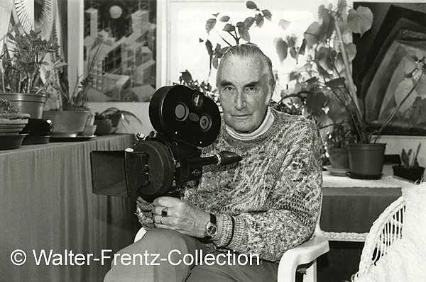 Walter Frentz at home in Uberlingen showing his WW2 Arriflex Camera (1980)