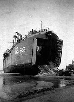This LST landed in high wind and seas.  It took three or four days at high tide to pull the ship free.
