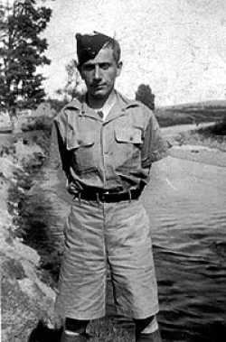 Simon Goldenthal in Uniform near river at Camp Borden, Ontario, 1940.