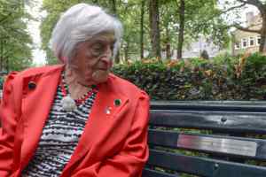 Lotty seated on the bench in the Apollolaan, Amsterdam