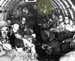 A few minutes before the11:07 pm take off for France, June 5th 1944. John is standing in the back in the green circle