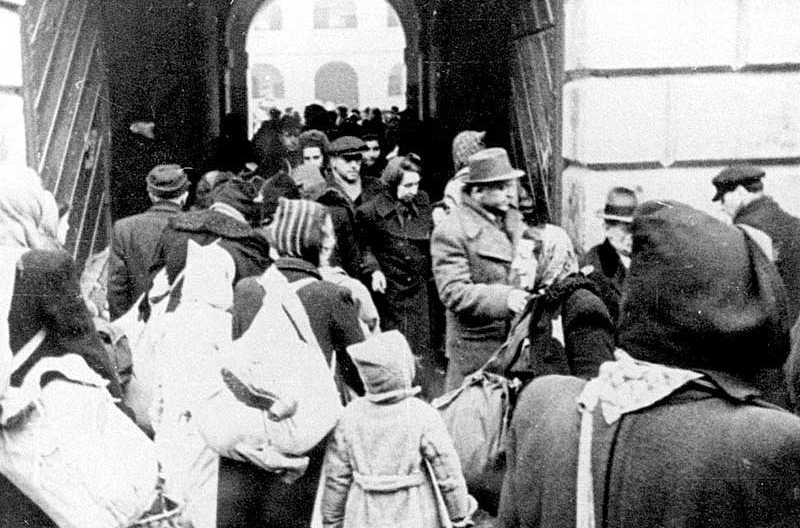 People enter the Theresienstadt ghetto