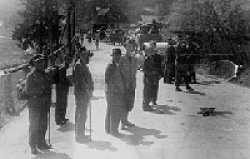 German civilians, believed to be Gestapo and Nazi Party officials, accompanying Germans troops entering Jägersgrün