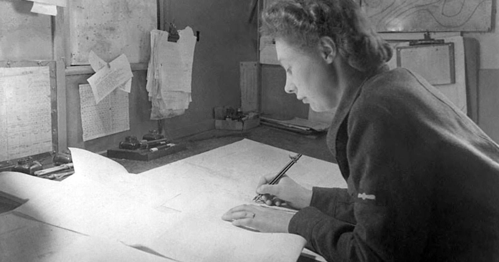 Female WAAF meteorologists analyzing Atlantic weather patterns data that influenced the critical decision to launch D-Day on June 6.