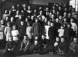 Daan lying (on the left) among his school friends in 1919