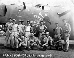 Albert with his team in front of their plane.