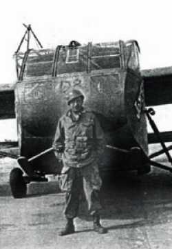 Sanford in front of his Waco glider plane