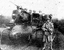 John Ausland in front of the M-7 in Germany. John did not serve as a cannoneer on an M-7. His duties were mostly as a forward observer who spent most of his time in combat up front with the infantry. He evidently had somebody take a picture of him in front of that M-7 to show people the type of weapons to which he was sending fire command directions.