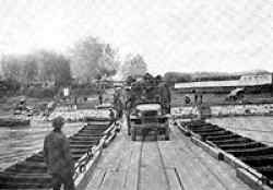 Crossing the Rhine, at Ludwigshafen-Mannheim, March 31, 1945. Note the bombed out buildings