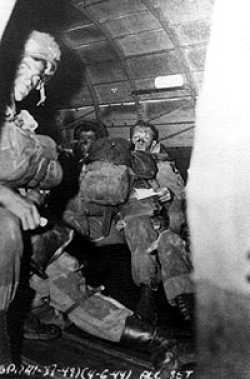 Upottery Airfield, England the 5th of June 1944. Approximately 10 PM. Stick # 76 of F Company 506th 101st Airborne Division. Left: Alvin "Black" Wilson Right: Bob "Dude" Stone Middle: Julius Houck