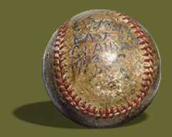 The baseball George used during the war if you look closely you will see the date on the ball: 1943.