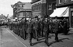 Brandon Manitoba November 11th 1943. Armistice Day Parade - Main Street F/L Fuller leading.