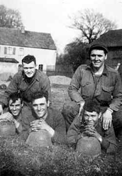 Front (L-R): Lester Zimmerman of Cheyenne,WY; Donato Marini of Malden, MA; Thomas McAbee of Spartenburg, SC Back (L-R): John McAuliffe of Worcester, MA; Glen Deel of NC. All members of lst squad, lst mortar section, 3rd platoon.