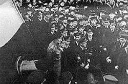 Monty speaks to the crew, notice Field Marshall Montgomery standing in the lower left part of the picture.