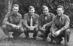 This picture was taken August 20, 1944 in Tilehurst-Reading, England, just a few weeks before the 101st participated in the Holland campaign in mid-September. I well recall the day this was taken for just seconds before, a German buzz bomb could be heard exploding over England not too far from where we had gathered.  All four of the young men, then in our early twenties, were lucky to survive the war without major physical damage and were able to return to America in late 1945