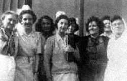 Elizabeth and another nurse with French women, who were kitchen workers in the special kitchen for the 100 bed psychiatric unit.