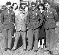 Showing off uniforms for the family. Back row from left: Sisters Pauline, Louise, and Francis. Front row from left: Andrew, Drennan, Walter, and Hogan..