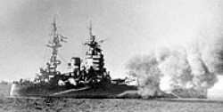 H.M.S. Rodney bombarding the coast of Normandy.