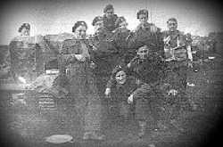Far left: Gareau, Back Center: Couller, Standing from left: Pnkney, Sgt. Corrigan, Wheaterstone, Marin, Bridge, Kneeling: Chalmers, Sgt. Wilson....