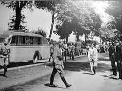 Civilian drivers with military police near Axel