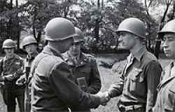 Dan in June 1945 receiving the Bronze Star from Brigadier General James M Lewis in Oelsnitz, Germany