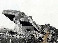 In front of destroyed German "pillbox"