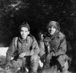 Henry Zimmerman on the right and Popeye Wynn, the picture was taken in the woods outside of Foy. The picture was taken in December 1944